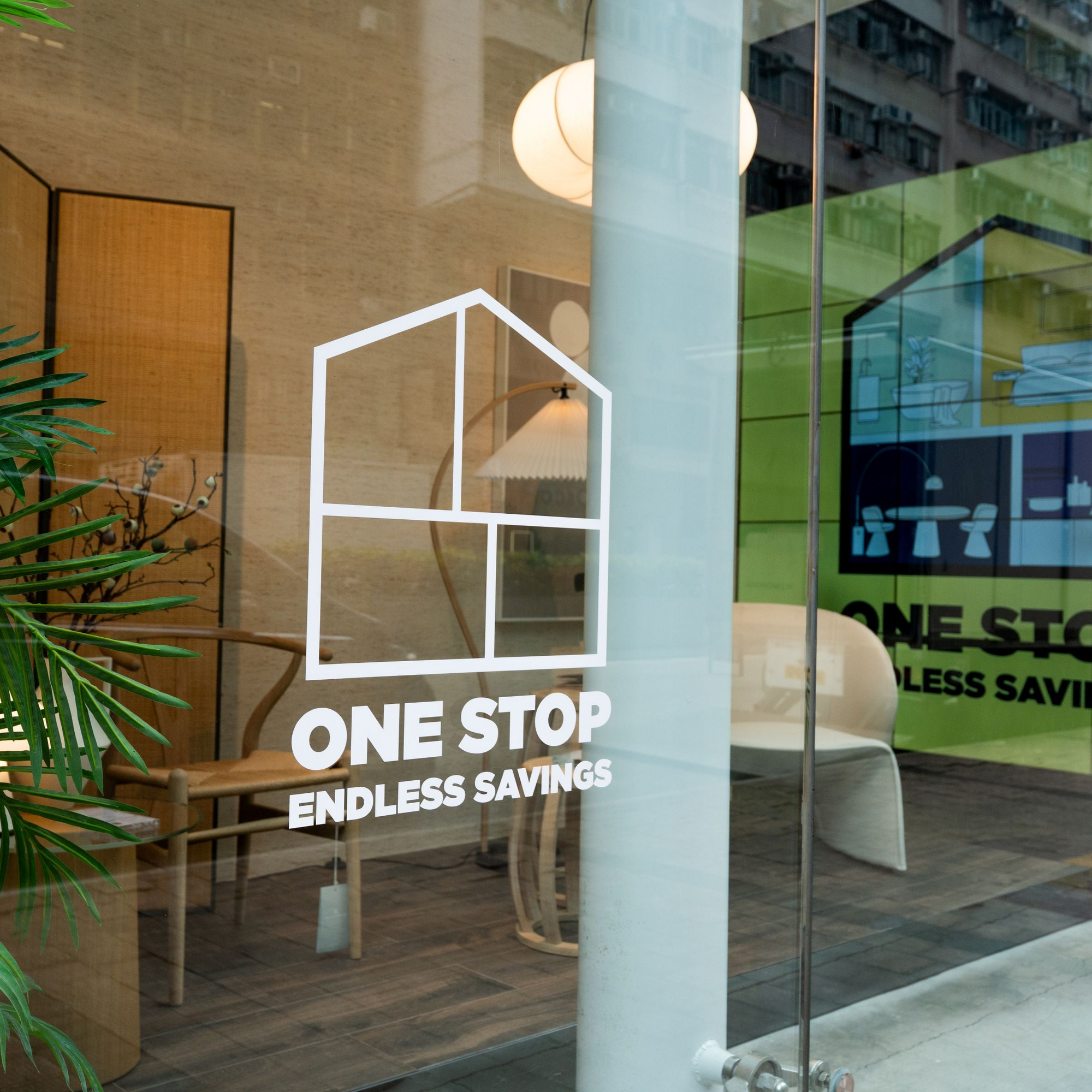 Glass door with 'One Stop Endless Savings' logo in an indoor setting