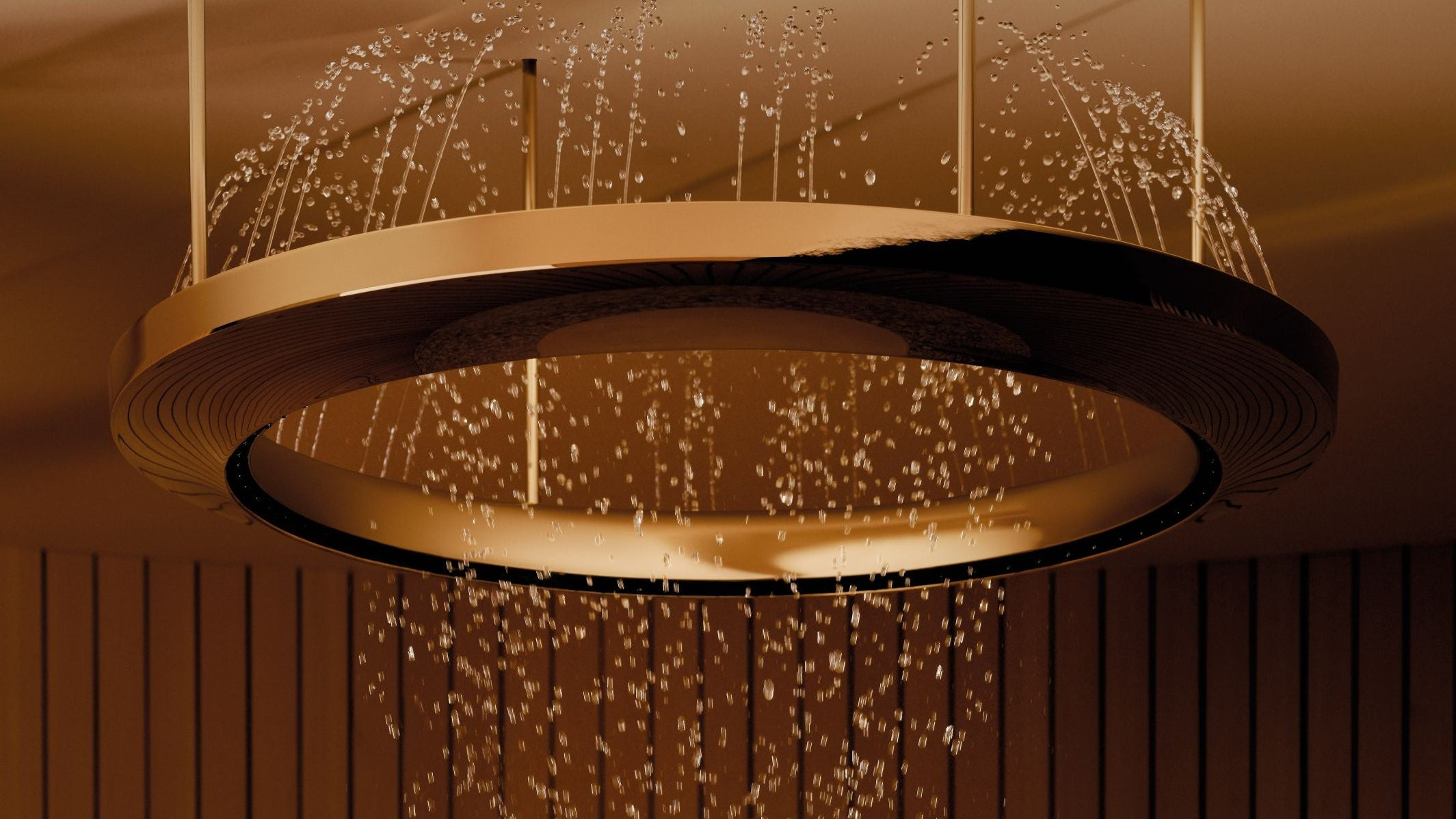 Chandelier with sparkling droplets against a dark background
