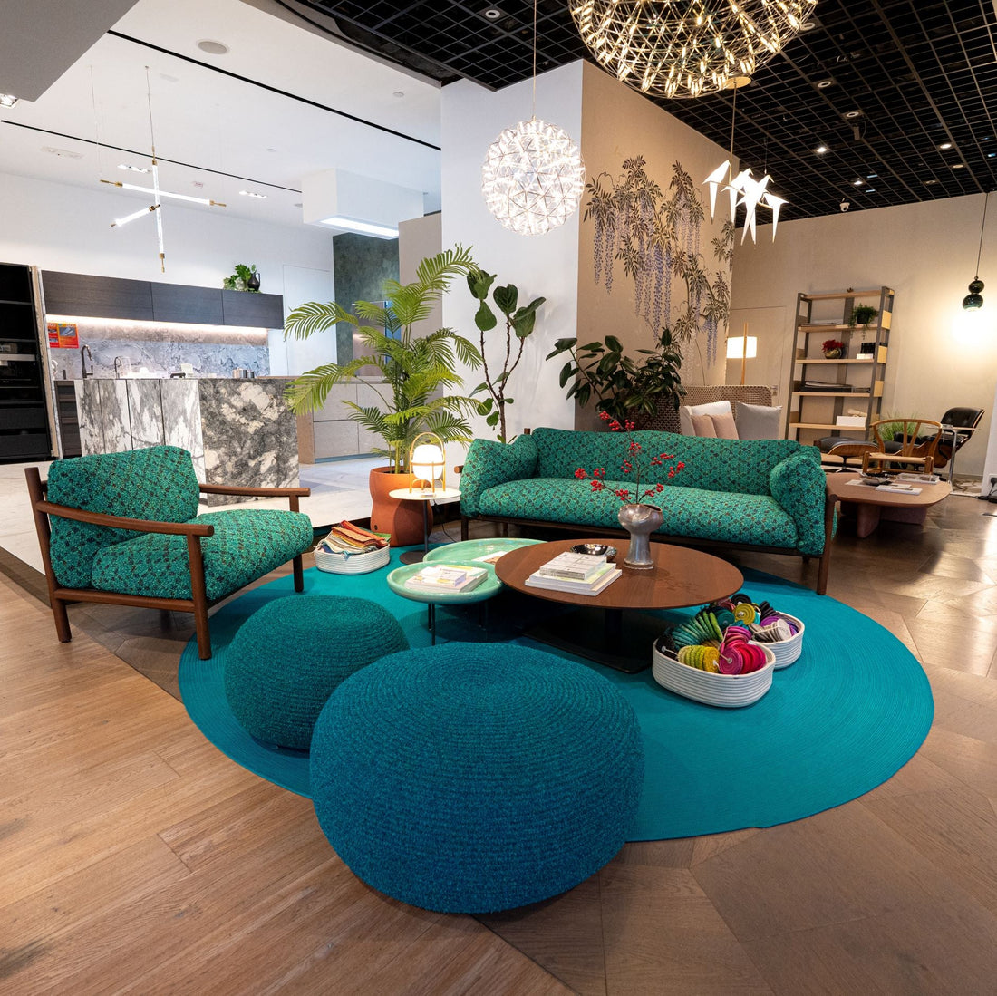 Modern lifestyle shop with teal furniture and decorative elements