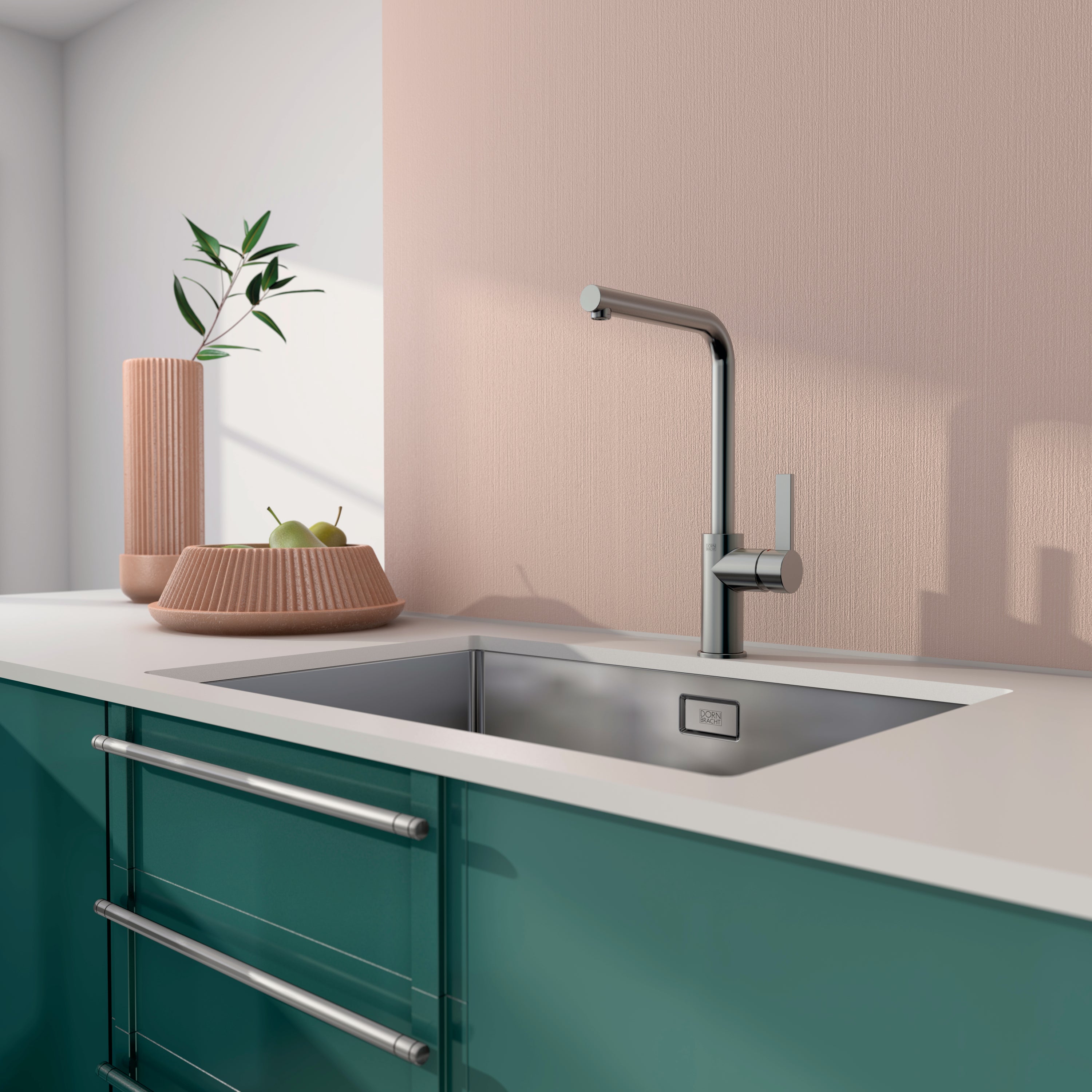 Modern kitchen with green cabinets, stainless steel sink, and pink backsplash.
