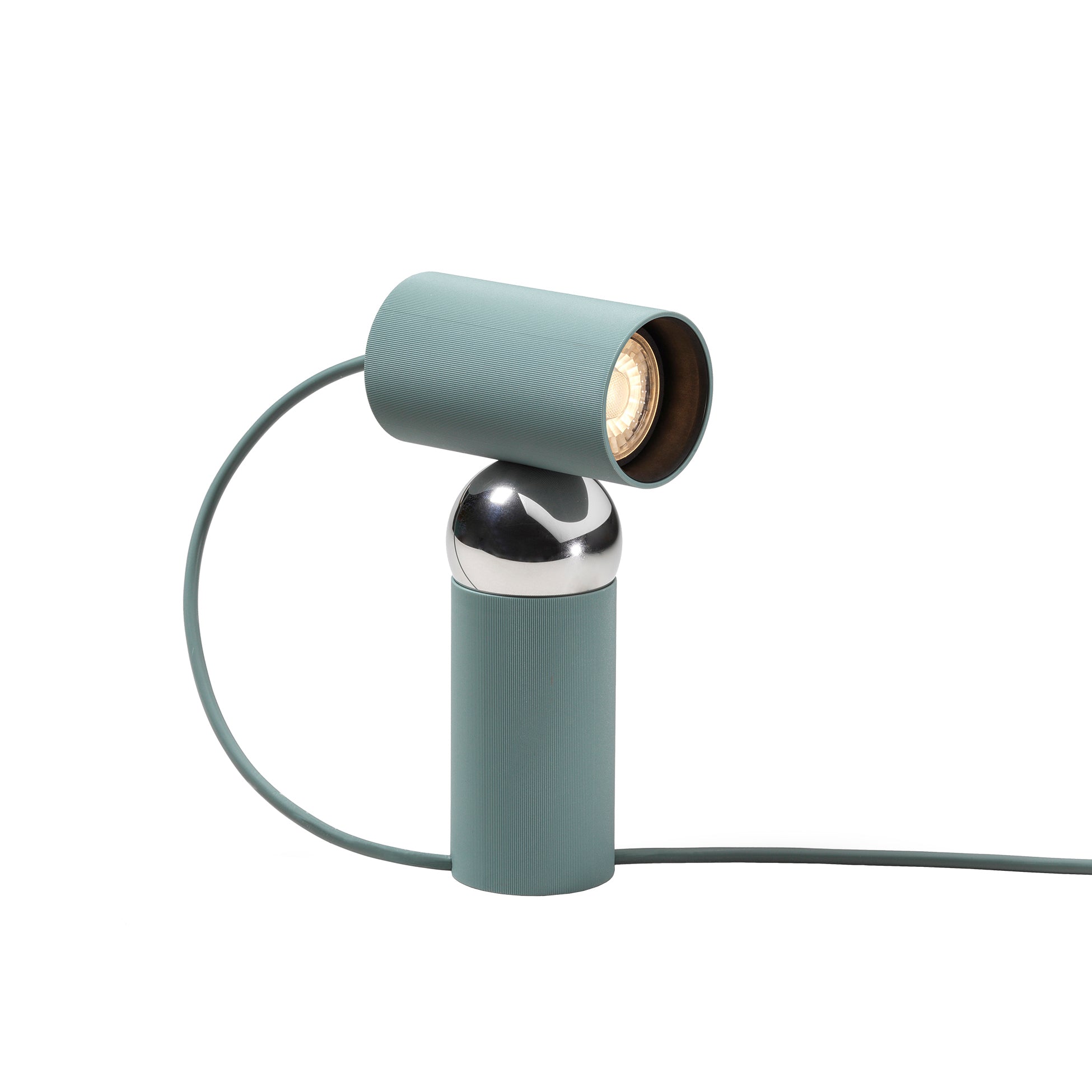Modern lamp with a cylindrical design in a light green color on a white background