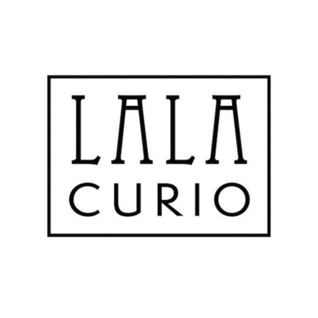 Logo of LALA CURIO on a white background