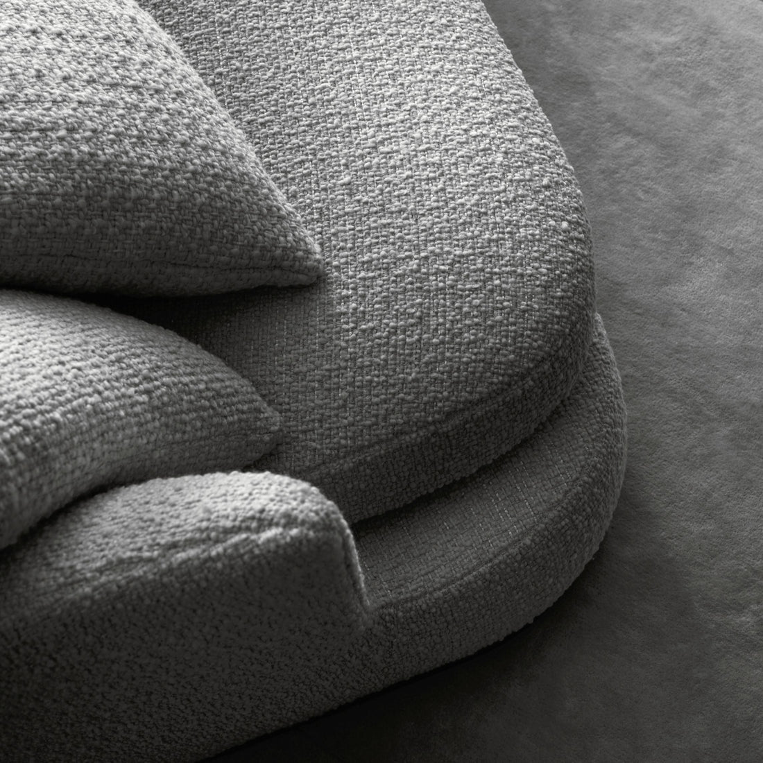 Close-up of a textured gray fabric surface