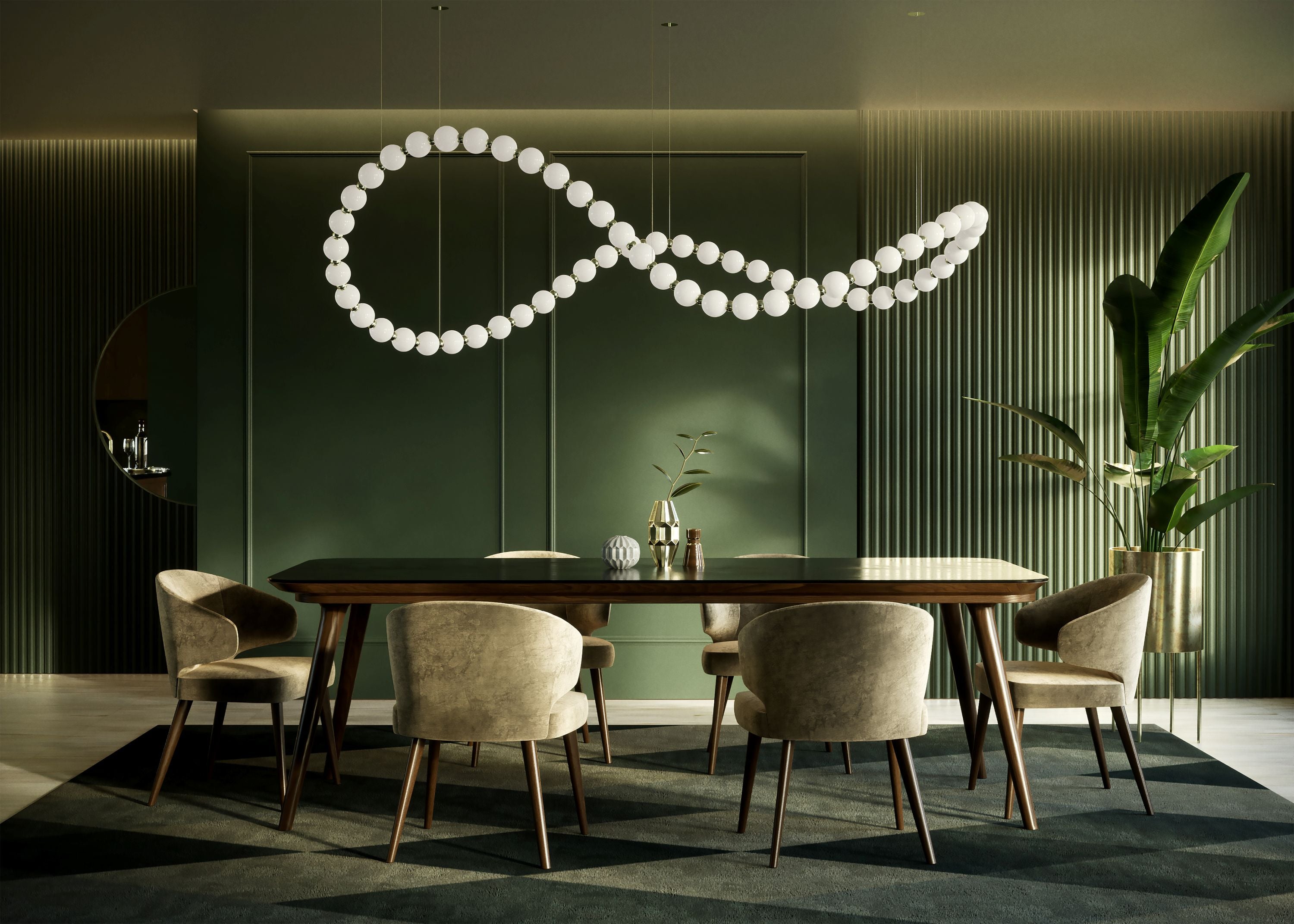Dining room with a long wooden table and chairs, featuring a modern light fixture.